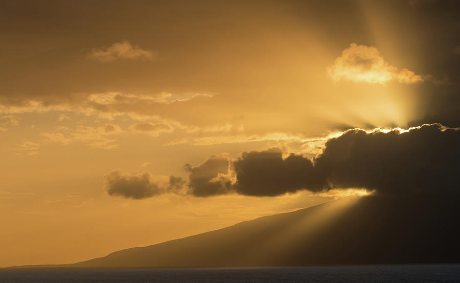 Sun setting behind the island of Molokai from Maui Photograph by Steven Heap