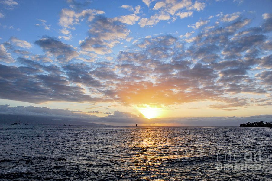 Sun setting in Lahaina on the Island of Maui Photograph by Gunther Allen