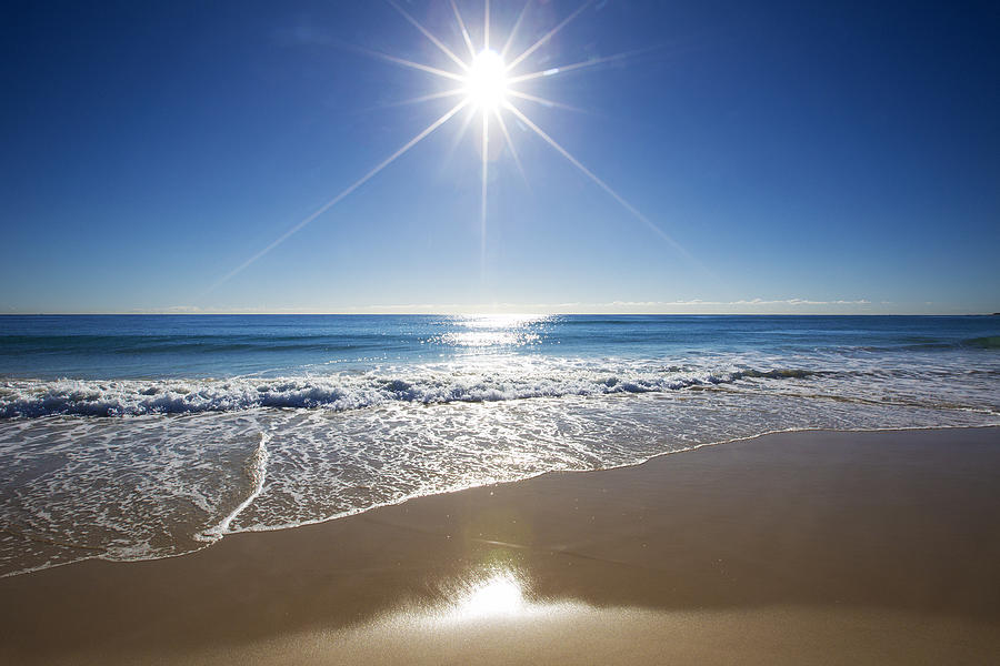 Sunbeam over the sea on Gold Coast, Queensland, Australia Photograph by Seanscott