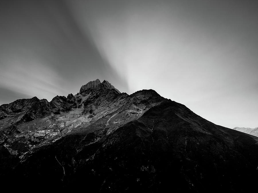 Sunbeams Behind Mountain Photograph by Pak Hong