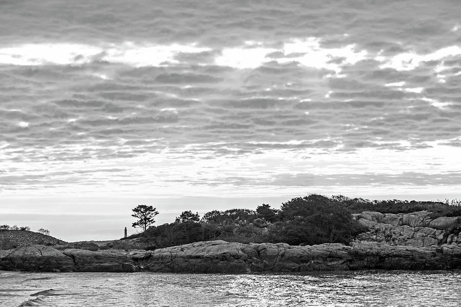 Sunbeams coming down on Thacher Lighthouse and Long Beach Rockport Massachusetts Black and White Photograph by Toby McGuire