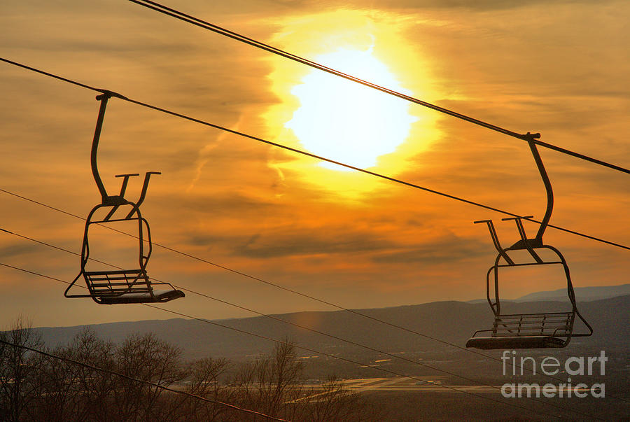 Sunburst Over The Montage Chairlift Photograph by Adam Jewell