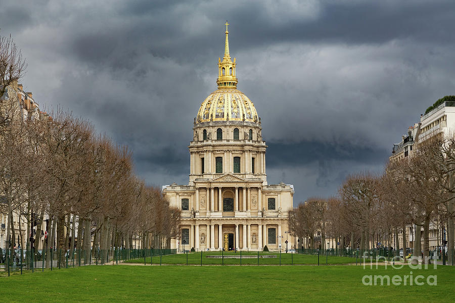Sunlight hits the golden dome of Les Invalides, built under Louis XIV in 1677 to house invalids of his armies, with dramatic stormy sky, Paris, France Photograph by Jane Rix