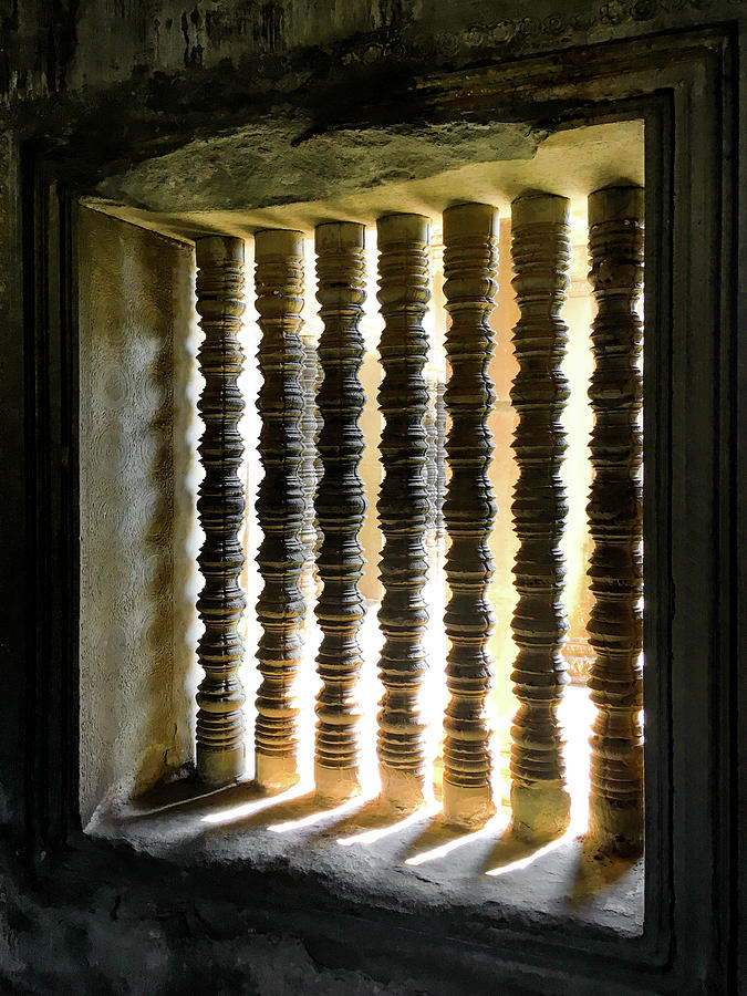 Sunlight through turned stone bars_Angkor Photograph by Christine Ley