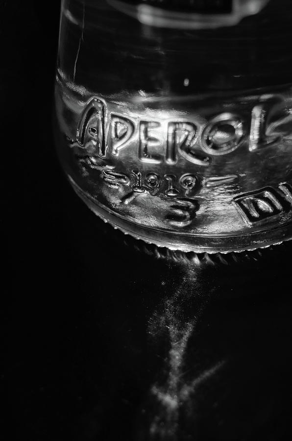 Sunlit Aperol Aperitif Glass Bottle with Sun Flare Macro Black White Photograph by Shawn OBrien