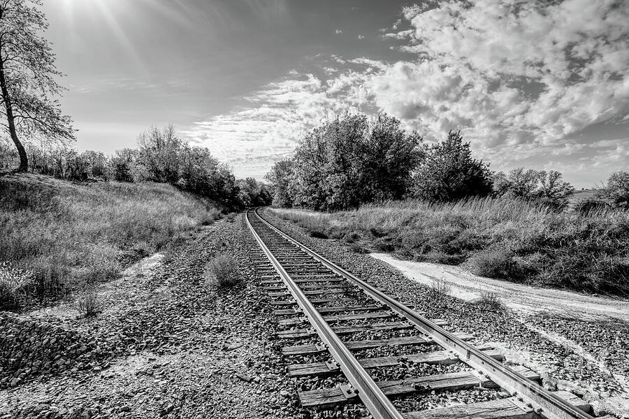 Sunrays Over Nebraska Railroad Tracks Grayscale Photograph by Jennifer White