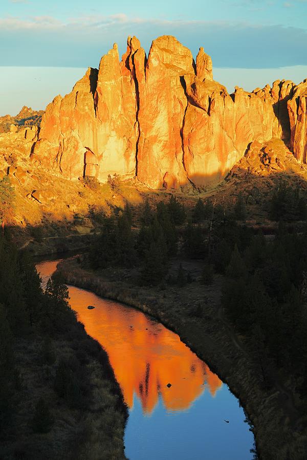 Sunrise and reflection at SmithRock Oregon Photograph by Brent Bunch