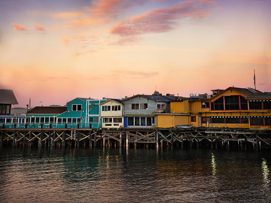 Sunrise and Wooden Buildings of Fishermans Wharf in Monterey Photograph by Vicki Jauron, Babylon and Beyond Photography