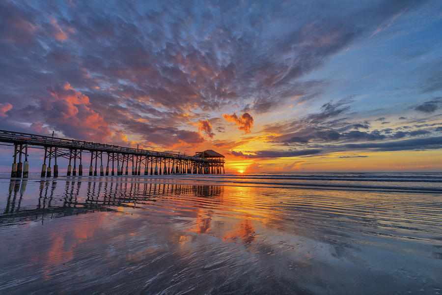 Sunrise at Cocoa Beach Pier Photograph by Claudia Domenig