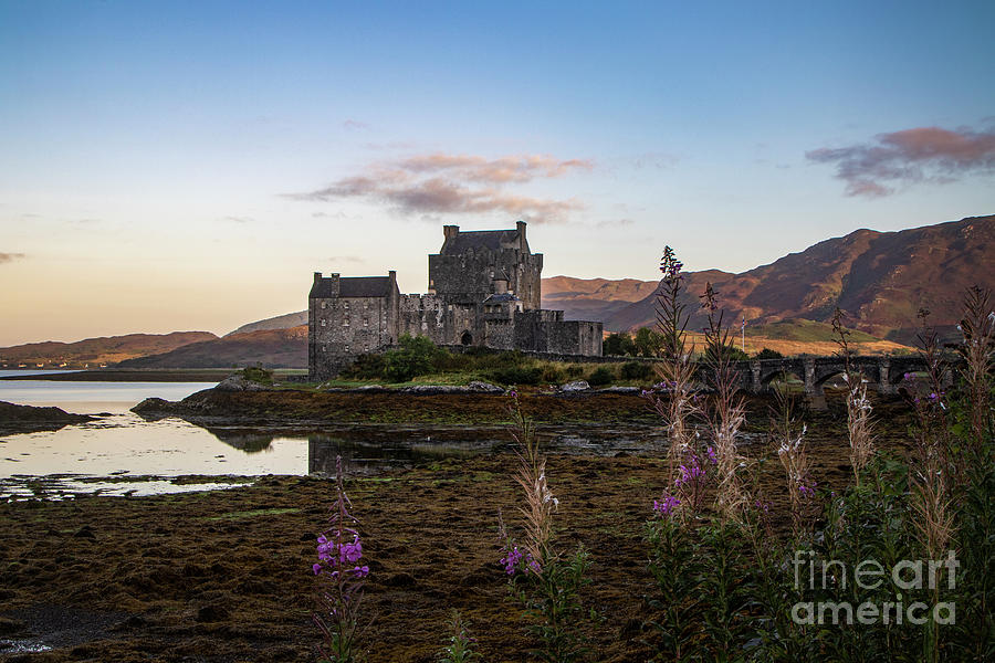 Sunrise at Eilean Donan Castle Photograph by Marcy Ford