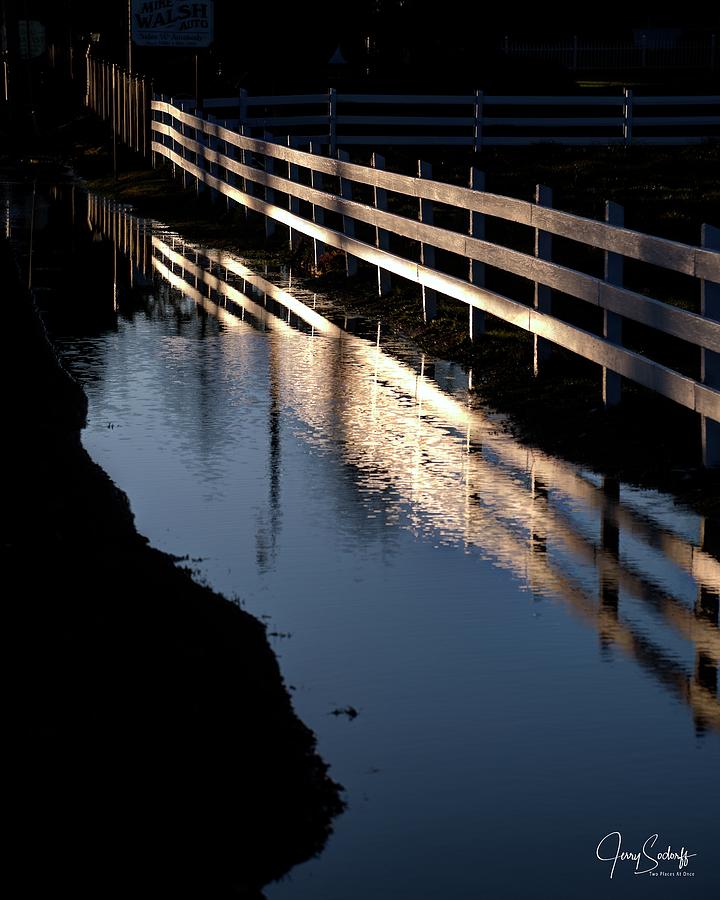 Sunrise Fence and Reflection Photograph by Jerry Sodorff