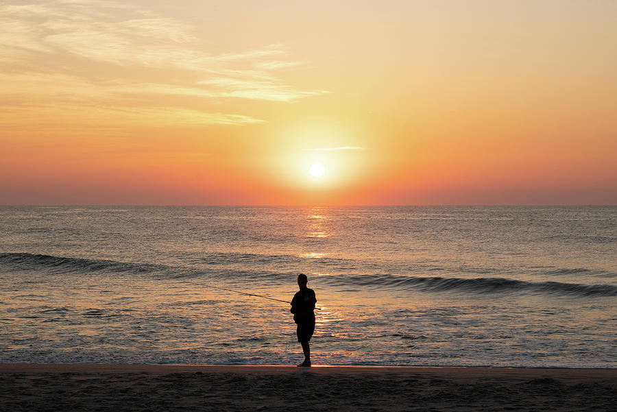 Sunrise Fisherman on the Jersey Shore Photograph by Matthew DeGrushe