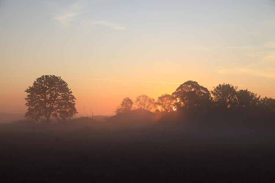 Sunrise on a beautiful misty morning Photograph by Pejft