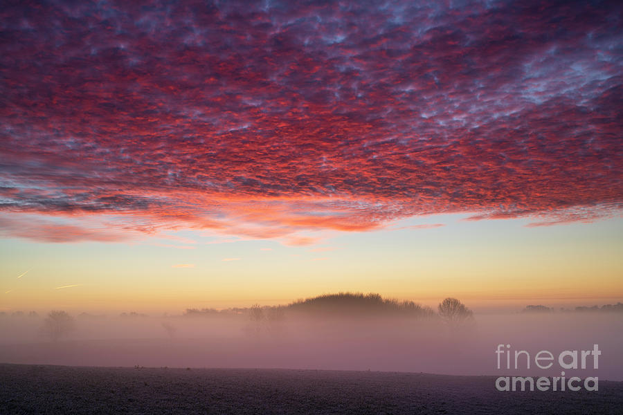 Sunrise on a Frosty Winter Morning over the Cotswolds Photograph by Tim Gainey