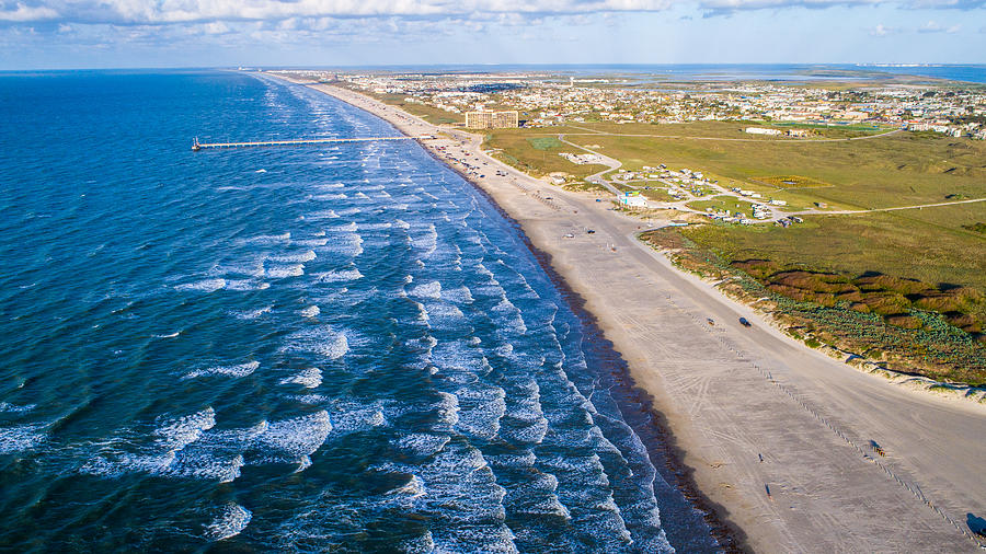 Sunrise on Padre Island from High Drone View with waves crashing along Beach Photograph by RoschetzkyIstockPhoto