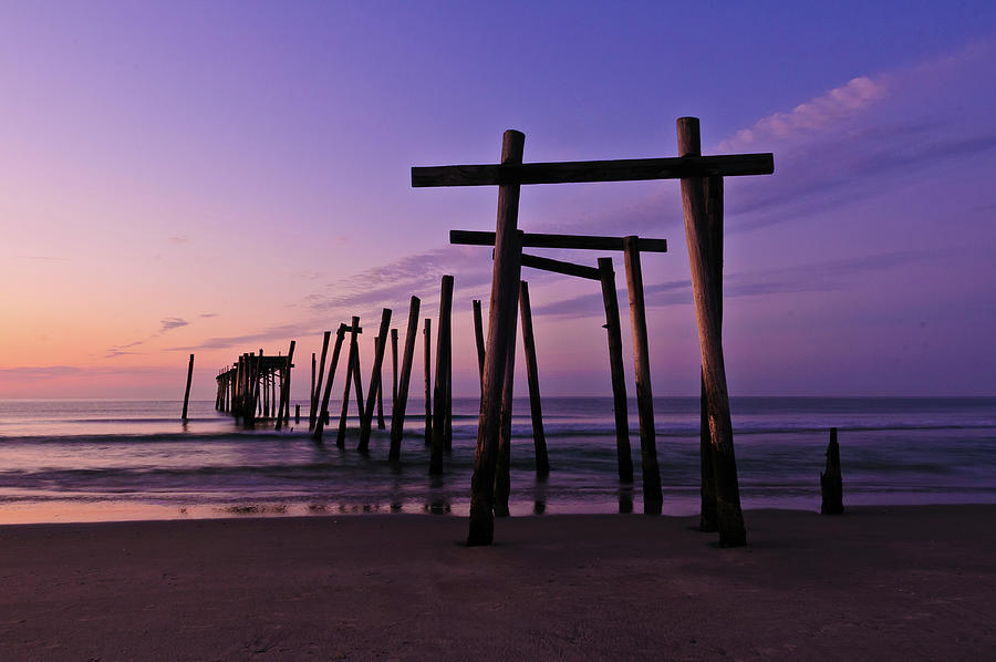 Sunrise on the beach Photograph by Louis Dallara