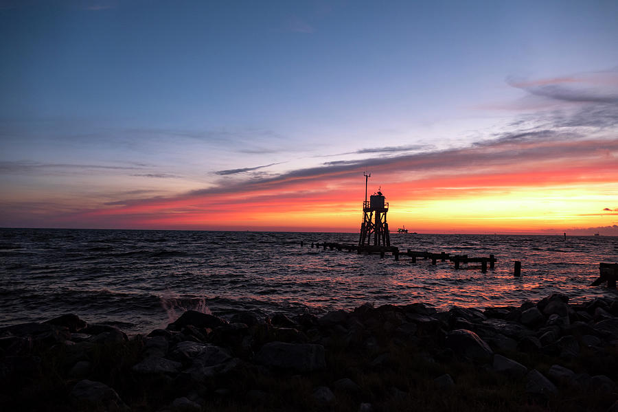 Sunrise on the Gulf Coast with Light House Photograph by Sandra Js
