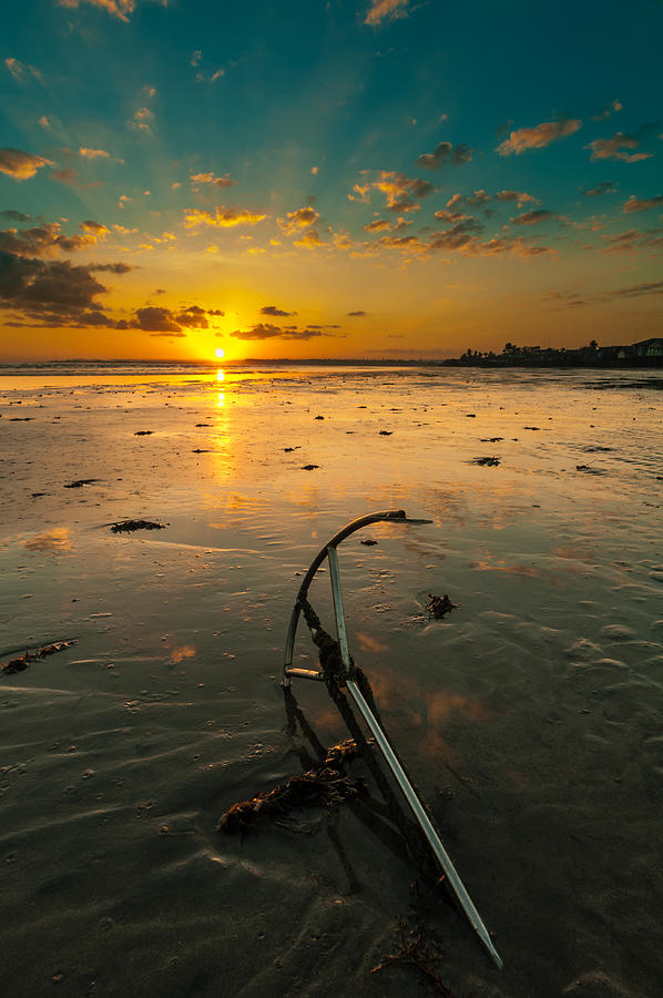 Sunrise over beach with anchor, Cadiz, Negros Occidental, Philippines Photograph by Manuel Jimenez