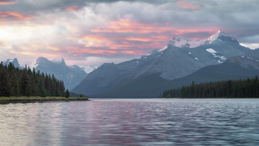 Sunrise over Maligne Lake in Jasper National Park in Canada Photograph by Peter Kolejak