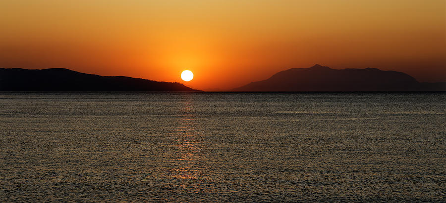 Greek Photograph - Sunrise over the Greek Island of Kos by John Gilham Greek Photograph - Sunrise over the Greek Island of Kos by John Gilham