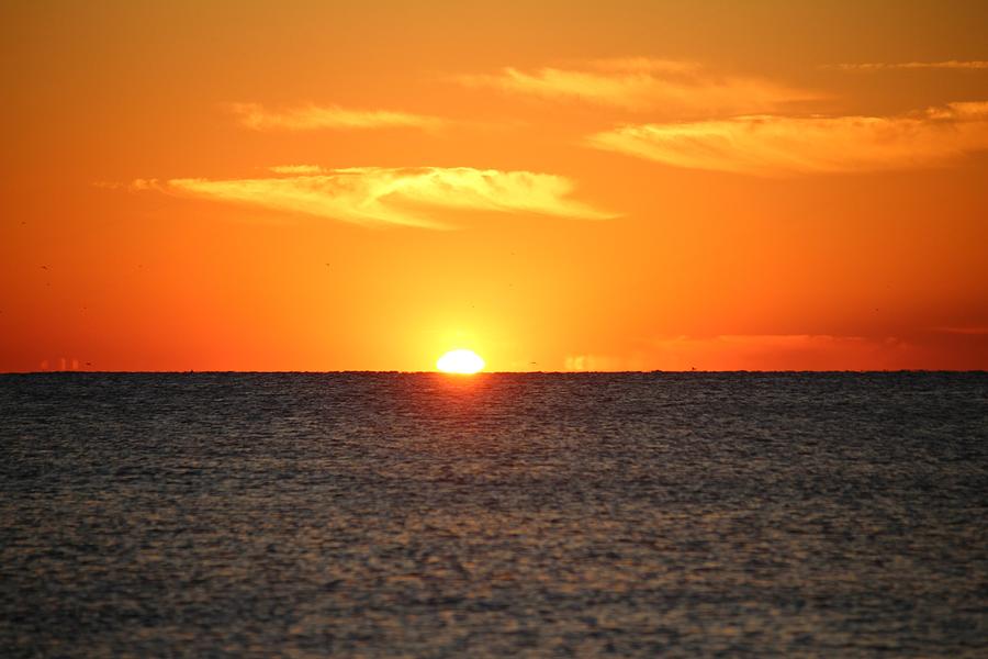 Sunrise Over The Sea Photograph by Cynthia Guinn
