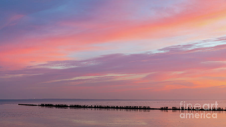 Sunrise over the Wadden sea Photograph by Henk Meijer Photography