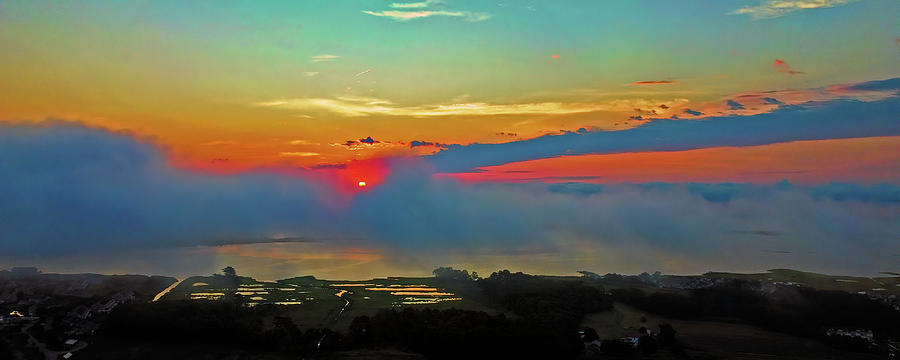 Sunrise Peekaboo Panorama over Fenwick Island Photograph by Bill Swartwout