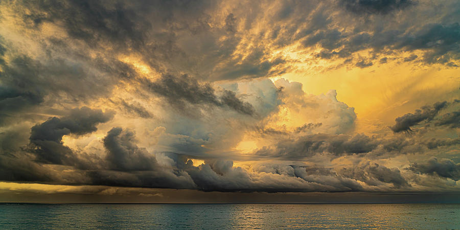 Sunrise Storm Clouds Photograph by Tommy Farnsworth