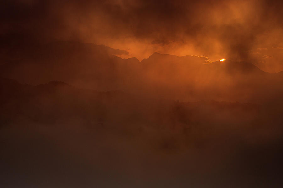 Sunrise through the mist Photograph by Ian Middleton