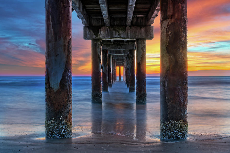 Sunrise Under The Pier In St. Augustine Florida Photograph by Jim Vallee