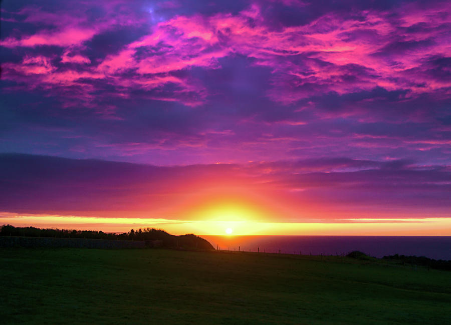 Sunrise with Purple Clouds Photograph by Alan Ackroyd