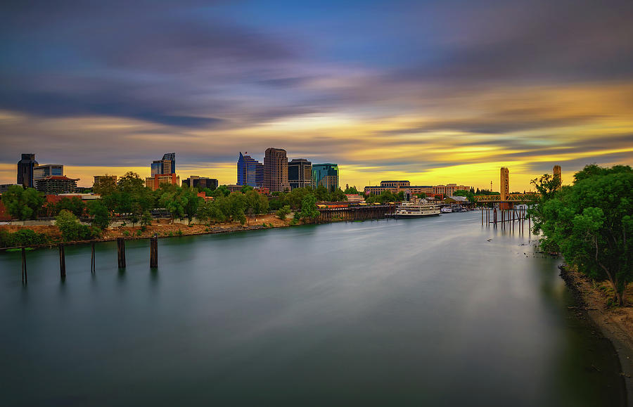 Sunset above Sacramento skyline, Sacramento River and Tower Bridge in California Photograph by Miroslav Liska Sunset above Sacramento skyline, Sacramento River and Tower Bridge in California Photograph by Miroslav Liska