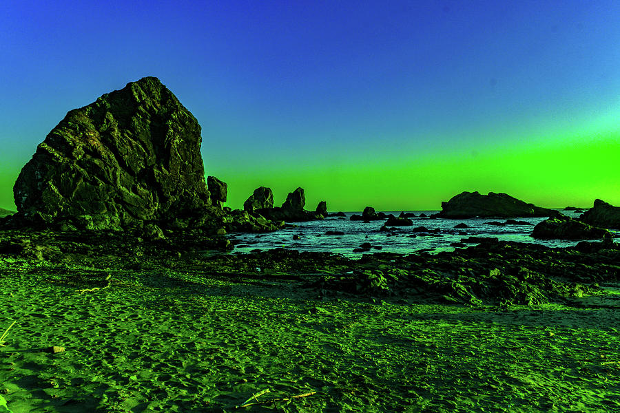 Sunset Among The Rocks Of Lone Ranch Beach Photograph