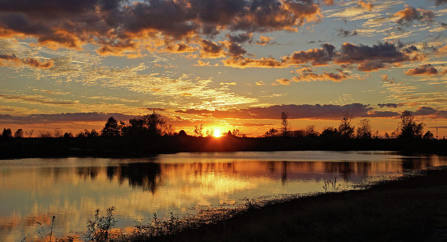 Sunset at Blue Grass Photograph by Sandy Keeton