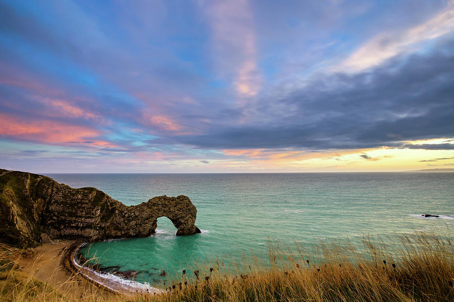 Sunset at Durdle Door Photograph by Ian Good