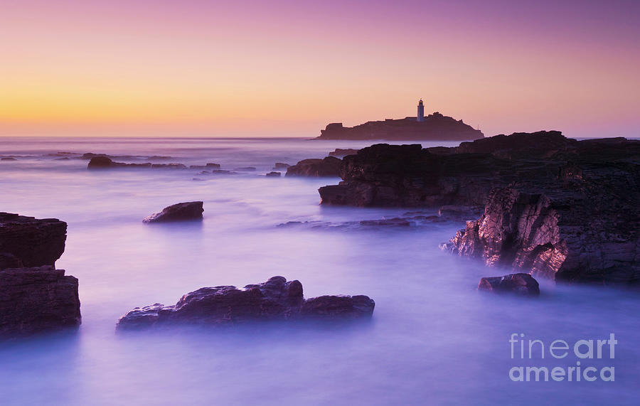 Sunset at Godrevy lighthouse, Cornwall, England Photograph by Neale And Judith Clark