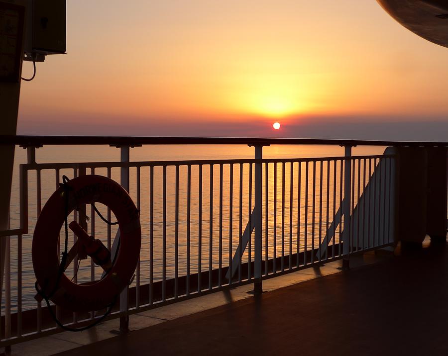 Sunset at sea Photograph by Lisa Mutch