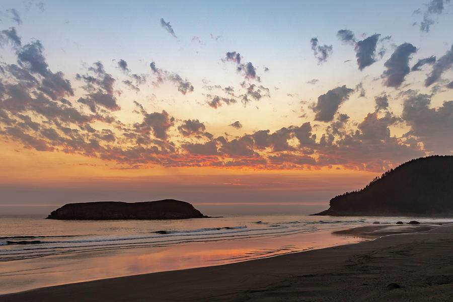 Sunset at the beach Photograph by Ed Clark