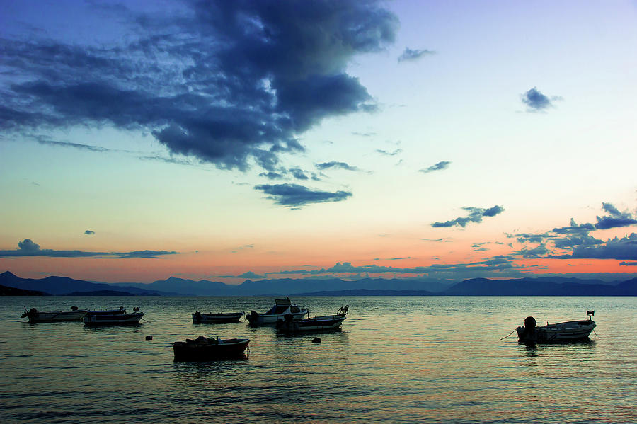 Sunset boat Photograph by Anna Kluba