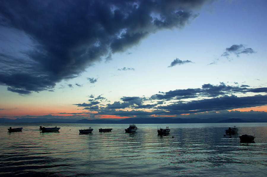 Sunset boats Photograph by Anna Kluba