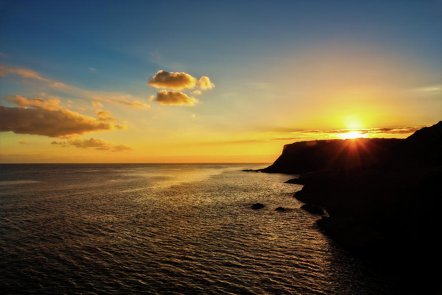 Sunset by the Sea in South Coast of Ireland Photograph by Artur Bogacki