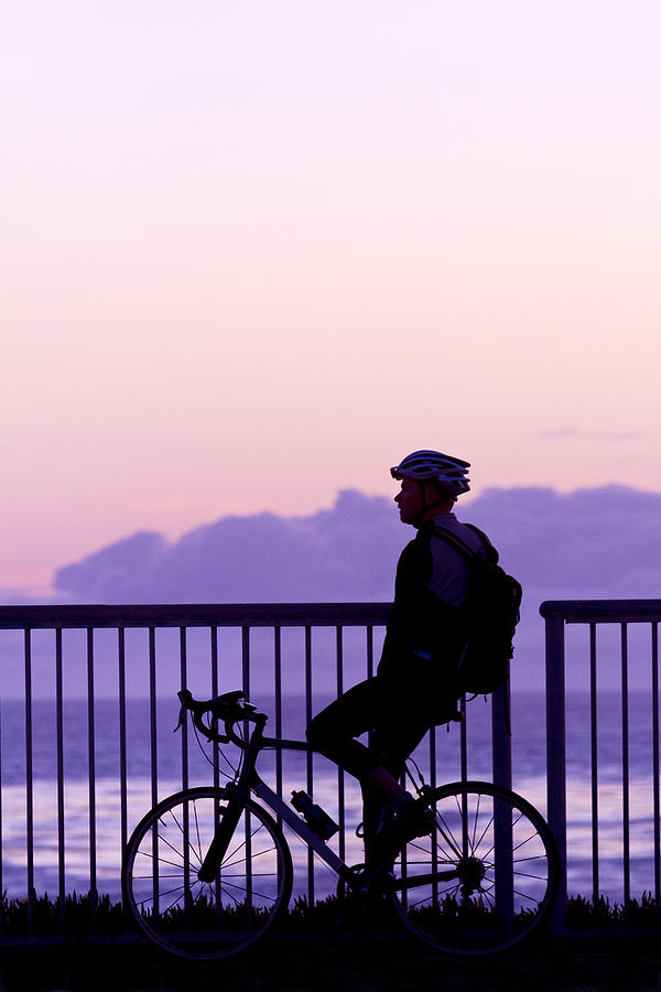 Sunset Contemplation while Bicycling on Shoreline Photograph by Mark Miller Photos