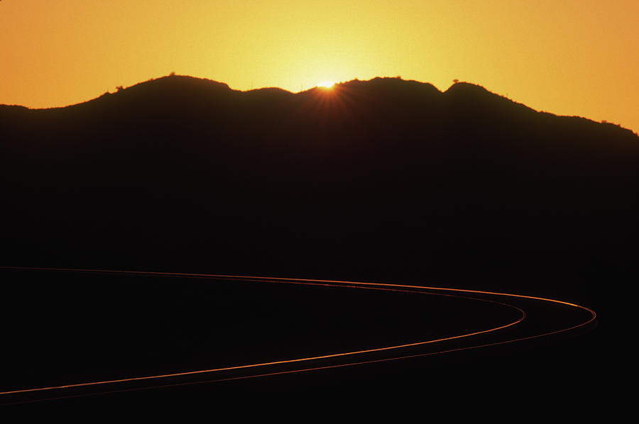 Train Photograph - Sunset Curve by Susan Benson