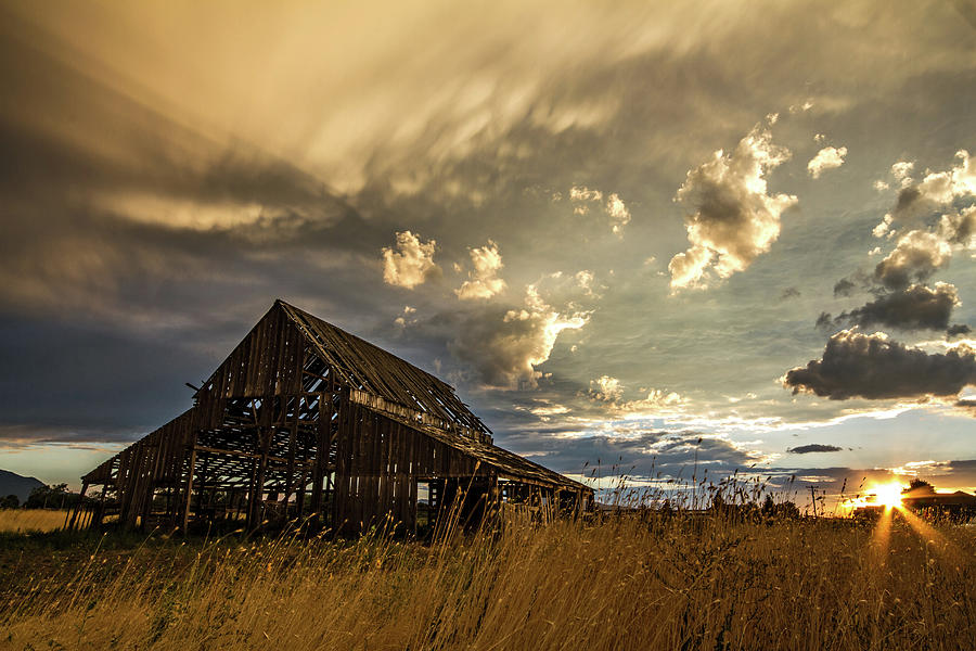 Sunset Flare at Mapleton Barn Photograph by Wesley Aston