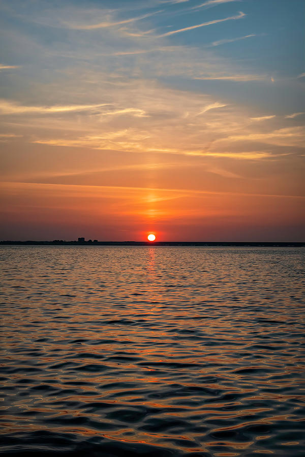 Sunset from the water Photograph by Marjolein Van Middelkoop