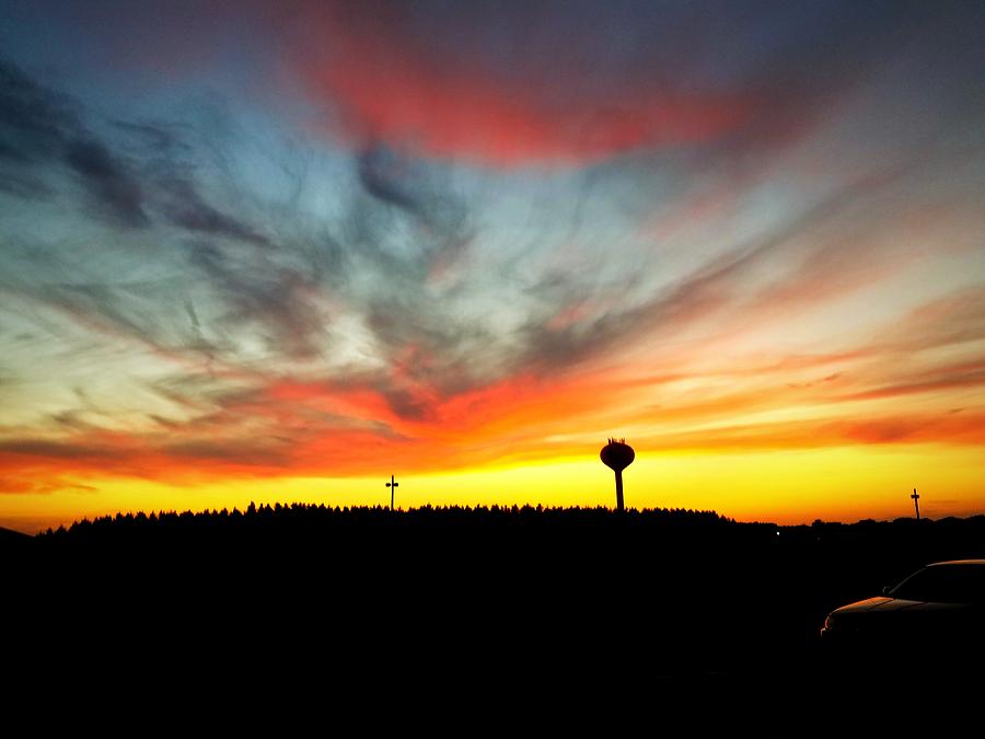 Sunset in a small town Photograph by Abigail Bridges