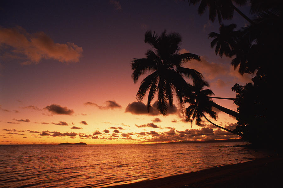 Sunset in Fiji Photograph by Comstock