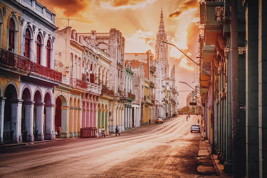 Sunset in Havana and a street full of traditional architecture Photograph by Karel Miragaya