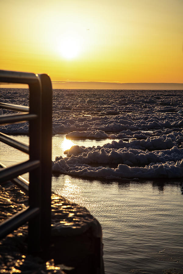 Sunset in Holland Michigan over Lake Michigan in the winter Photograph by Eldon McGraw