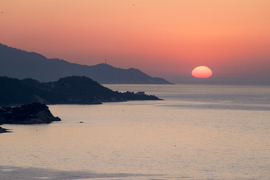 Sunset in the Aegean sea Photograph by George Pachantouris